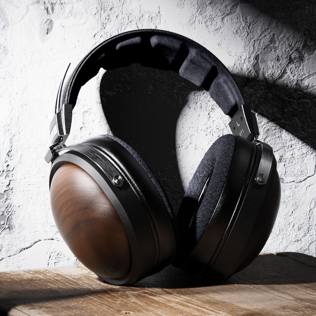 FiiO FT1 — over-ear cerrado con driver dinámico de 60 mm, 32 Ω, 113 dB/Vrms, 10–40 kHz, ≈340 g, cables SPC (plateado/OFC) desmontables con dual 3,5 mm.