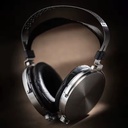 MOONDROP PARA II — over-ear abierto con driver planar magnético de 100 mm (FDT, circuito de plata, TBT) · 9 Ω · 106 dB/Vrms · 20–42 kHz (efectiva 20–20 kHz) · conexión dual 3,5 mm · cable 4,4 mm balanceado + adaptador 3,5 mm.